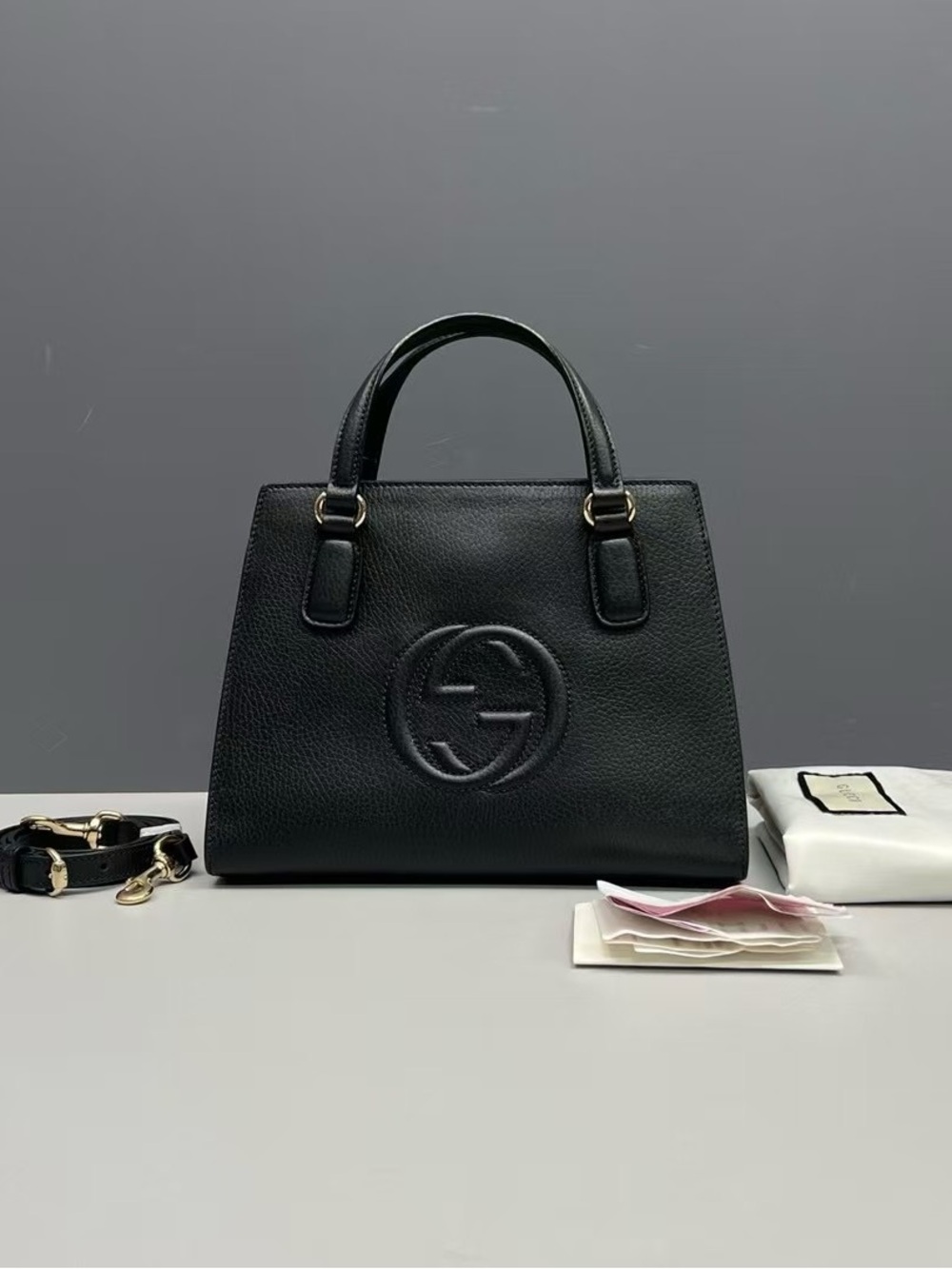 Gucci Black Leather Embossed Logo Satchel